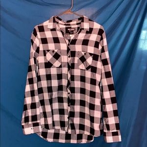 Women’s button up shirt with studded skull on back